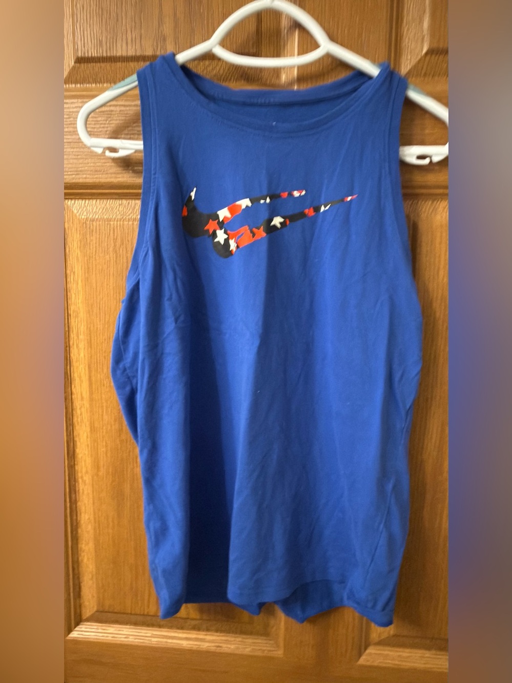 Nike Royal Blue Sleeveless Tank with Star-Patterned Swoosh